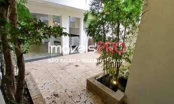 Imagem 7: Casa semi-isolada, com quintal em L, área de lazer com churrasqueira