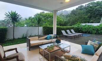 Imagem 2: Casa de condomínio para venda tem 601 metros quadrados com 6 quartos