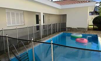 Imagem 2: Casa de condomínio térrea para aluguel tem 220 metros quadrados com 3 quartos