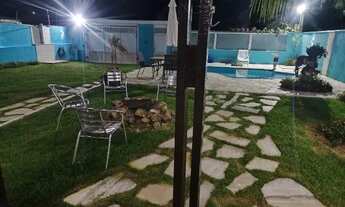 Imagem 6: Casa Temporada Caraguá em Massaguaçu 3 quartos sendo uma suíte. Piscina e churrasqueira