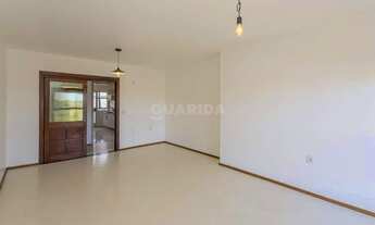 Imagem 3: Apartamento semimobiliado com 3 dormitórios, sendo 1 suíte, e 2 vagas de garagem no bairro