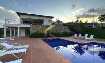 Imagem 2: Casa à venda em condomínio na região do Alphaville com 3 suítes (1 térrea), espaço gourmet