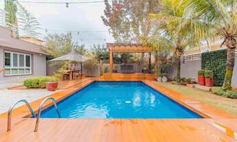 Imagem 2: Casa de condomínio para venda possui 434 metros quadrados com 4 quartos