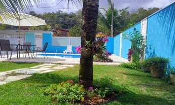 Imagem 4: Casa Temporada Caraguá em Massaguaçu 3 quartos sendo uma suíte. Piscina e churrasqueira