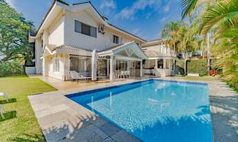 Imagem 2: Casa de condomínio para venda tem 440 metros quadrados com 4 quartos