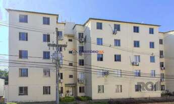 Imagem 2: Apartamento semimobiliado com 2 dormitórios, banheiro social e 1vaga rotativa