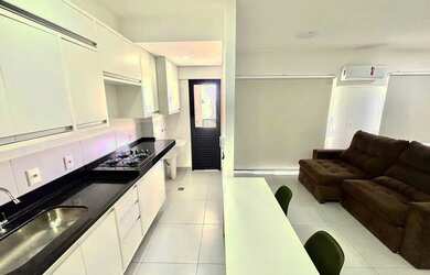 Imagem: Studio moderno com sacada gourmet e lazer