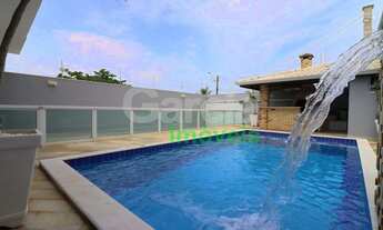 Imagem 2: Sobrado com piscina perto da praia com 4 dormitórios