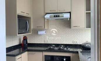 Imagem 2: Apartamento com 3 dormitórios para alugar, 89 m² por R$ 3.423,00/mês - Vila Gilda - Santo