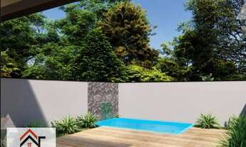 Imagem 2: Casa com 2 suítes sala 2 ambientes, area gourmet com piscina e churrasqueira. AT 181, 81 m