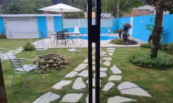 Imagem 5: Casa Temporada Caraguá em Massaguaçu 3 quartos sendo uma suíte. Piscina e churrasqueira