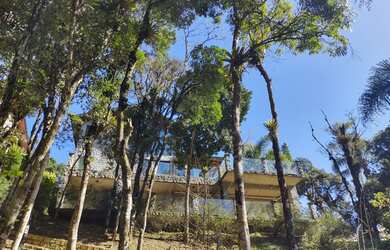 Imagem 5: Casa de condomínio para venda possui 320 metros quadrados com 4 quartos