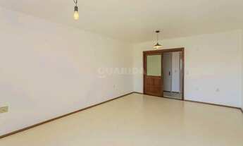 Imagem 4: Apartamento semimobiliado com 3 dormitórios, sendo 1 suíte, e 2 vagas de garagem no bairro