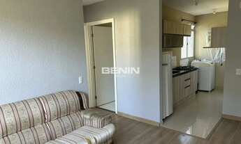 Imagem 3: Apartamento 02 dormitórios, semi mobiliado inclusive com eletrodomésticos e uma vaga desco