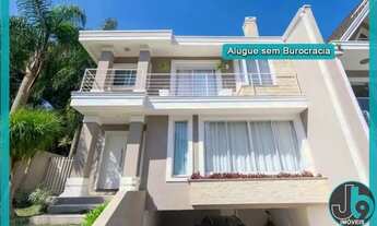 Imagem 2: Casa em condomínio para Alugar no Orleans com 4 Quartos, 2 Suítes e 4 Vagas de Garagem com