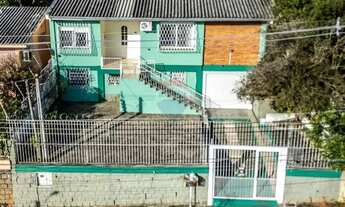 Imagem 2: Conforto e Natureza Juntos: Casa Acolhedora com Árvores Frutíferas