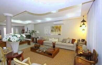 Imagem 3: EXCELENTE CASA COM 4 DORMITÓRIOS, 6 VAGAS DE GARAGEM E VISTA PANORÂMICA