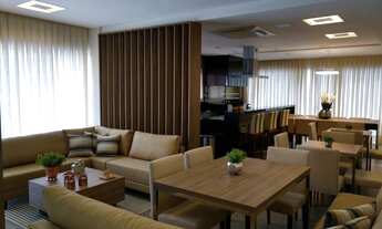 Imagem 6: Três dormitórios com suíte semi mobiliado andar alto vista mar e sol da manhã em condomíni