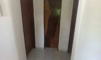 Imagem 4: Casa grande com um Terreno ao lado, árvores frutíferas e um pequeno rio