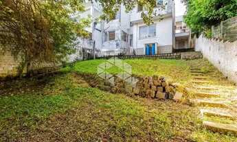 Imagem 3: Casa, no andar térreo, living, 3 dormitórios, sendo uma suíte, banheiro social com hidroma