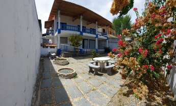 Imagem 2: Sobrado para venda com 386 metros quadrados com 3 Suites 2 quartos em Porto das Dunas - Aq