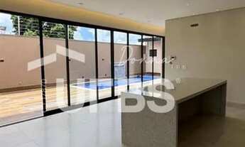 Imagem 5: Casa à venda no Setor Garavelo 3 suítes, área gourmet e piscina aquecida, próxima ao Jard