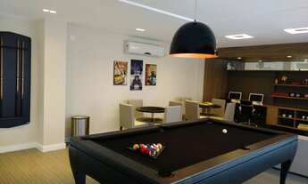 Imagem 5: Três dormitórios com suíte semi mobiliado andar alto vista mar e sol da manhã em condomíni