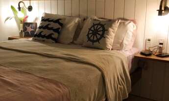 Imagem 2: Flat com 2 dormitórios à venda, 57 m² por R$ 900.000,00 - Riviera - Módulo 26 - Bertioga/S