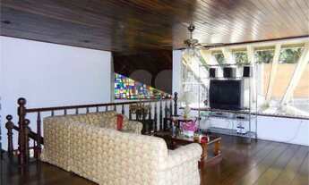 Imagem 7: Magnífica casa térrea com mezanino em madeira, home office suspenso com vista para a pisci