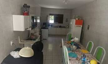 Imagem 6: Casa grande com um Terreno ao lado, árvores frutíferas e um pequeno rio