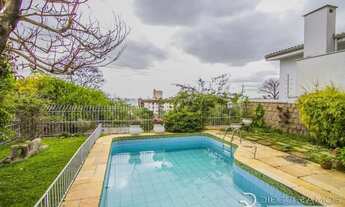 Imagem 2: Casa 3 dormitórios/quartos, sendo uma suite com hidromassagem, com piscina, bairro Menino