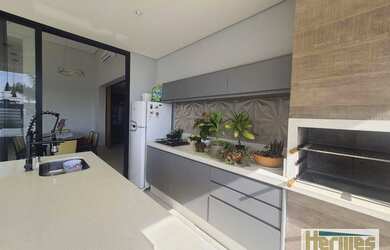 Imagem 2: Casa com 3 dormitórios para alugar, 242 m² por R$ 7.566,25/mês - Terras do Cancioneiro - P