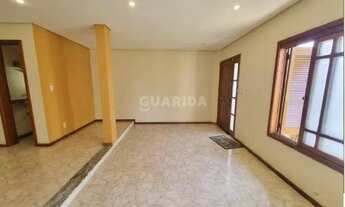 Imagem 4: Casa em Condomínio com 4 dormitórios, sendo 1 suíte, e 2 vagas de garagem no bairro Camaqu