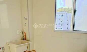 Imagem 2: Imóvel com 2 dormitórios, 1 banheiro social, sala de estar e jantar, cozinha