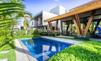 Imagem 2: Casa alto padrão com 4 suítes à venda, 322m², em condomínio fechado com acesso exclusivo à