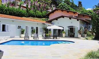 Imagem 4: Casa de condomínio térrea para venda possui 800 metros quadrados com 6 quartos