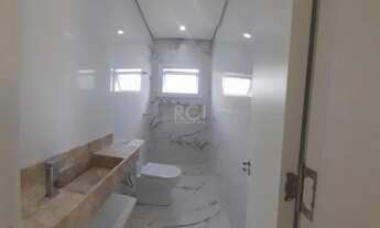 Imagem 7: Casa em condomínio com 3 dormitórios, sendo 1 suíte no centro de Gravataí