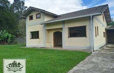 Imagem 2: Casa de cinco quartos (sendo 02 suítes), duas salas, copa cozinha, gramado, excelente loca