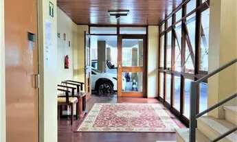 Imagem 5: Apartamento 2 dormitórios semimobiliado, living 2 ambientes com lareira, cozinha e área de