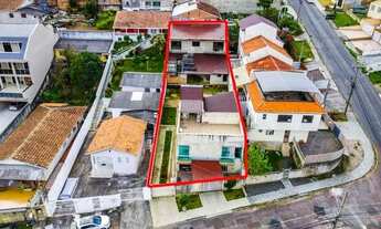 Imagem: Terreno com dois sobrados guabirotuba