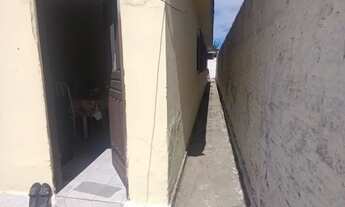 Imagem 7: Casa grande com um Terreno ao lado, árvores frutíferas e um pequeno rio