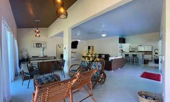 Imagem 3: Casa térrea em condomínio com 4 dormitórios e área de lazer com piscina e churrasqueira