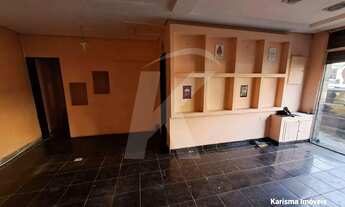 Imagem 7: Salão comercial com 2 banheiros e porta de aço