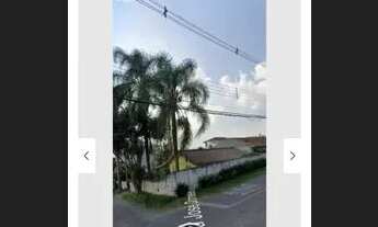 Imagem: Terreno com uma casa em madeira, aceitamos