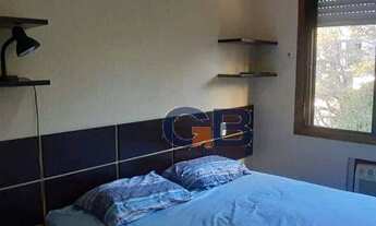 Imagem 6: Apartamento com 2 dormitórios sendo uma suíte, sacada com linda vista para o por do sol co