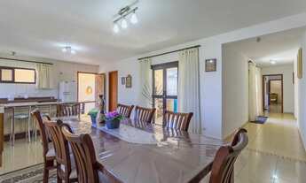 Imagem 6: Terreno com 3.000 m² e 297 m² de área construída ampla com 3 dormitórios (1 suíte com hidr