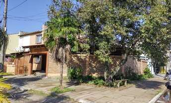 Imagem 2: Sobrado para Venda em Alvorada, Jardim Algarve, 3 dormitórios, 1 suíte, 2 banheiros, 2 vag