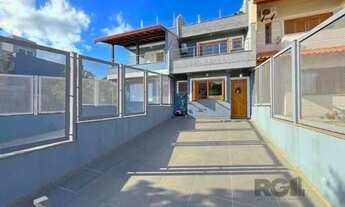 Imagem 3: Casa em Porto Alegre, no bairro Guarujá, com 3 dormitório(s), e 3 banheiros, à v