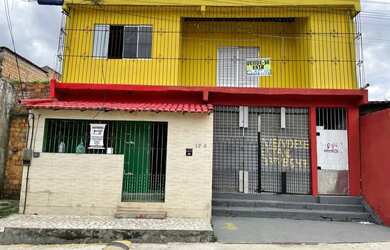 Imagem: Vendo um Prédio com um ponto comercial