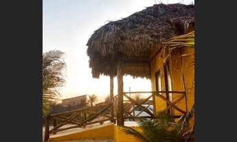 Imagem 6: Chale na praia peito de moça